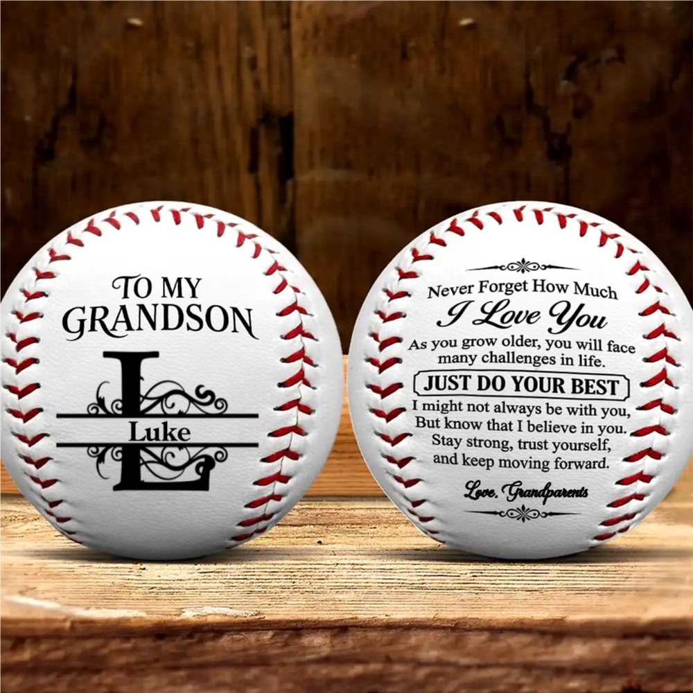 Personalized baseball for a grandson named Luke: front shows To My Grandson above a monogram of the letter L, back shows the printed message and the signature Love, Grandparents